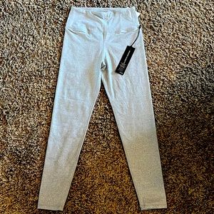 Woman’s gray Kyodan small leggings. Brand new with tags.